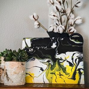 Yellow, black, white pour painting